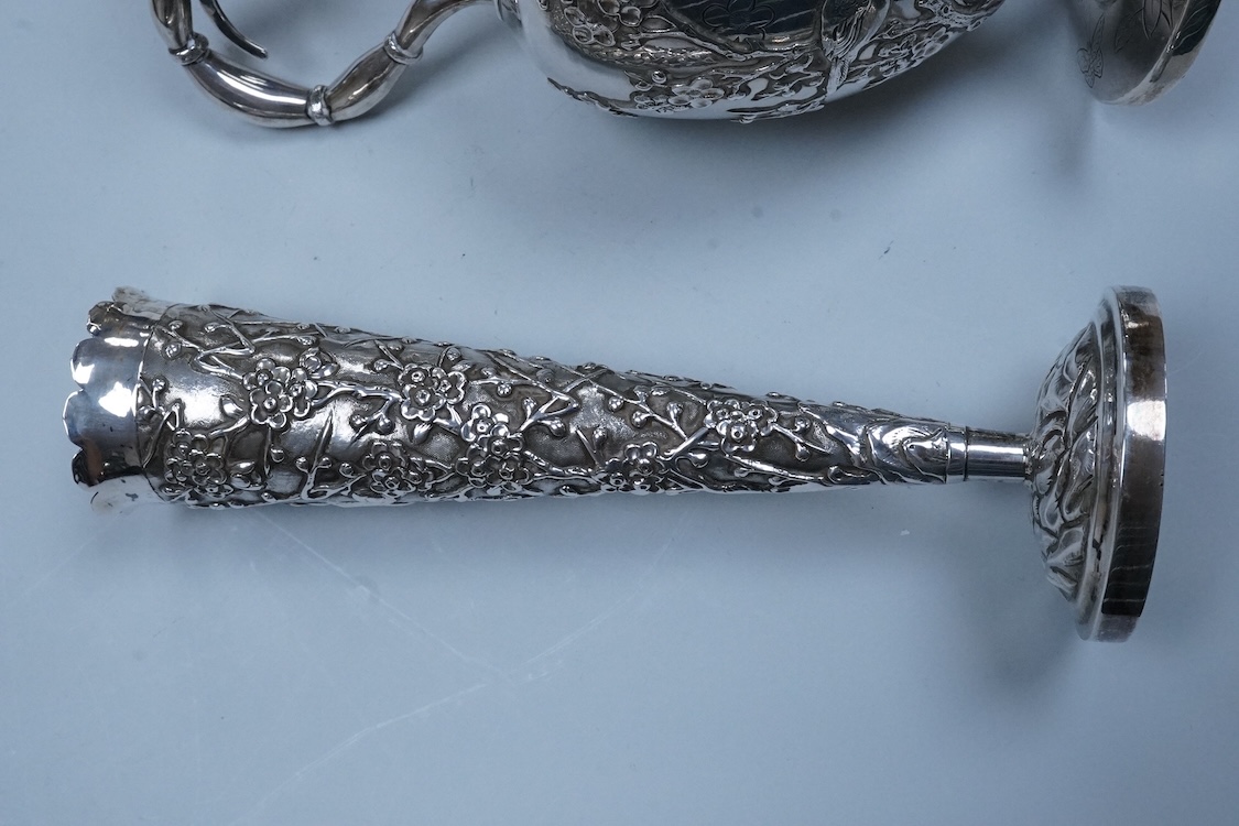 An early 20th century Chinese Export white metal posy vase, by Wang Hing, 18.4cm and a similar ewer by Tien Shing?, lacking cover.